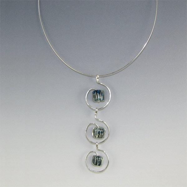   from fused fine silver and glass art beads by lampworker Toni Lutman